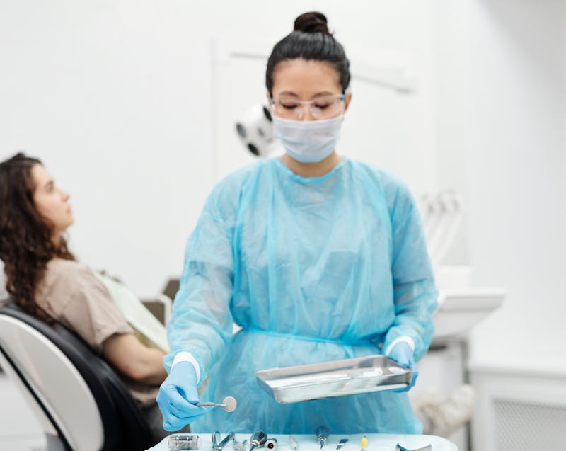 a dentist and her patient